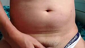 Gay boy masturbates under underwear intriguingly