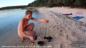 Adorable European Girl Performs Nude Fire Dancing on Beach at Sunset