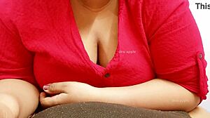 The Asian milf says, 'Watch me play with my big boobs.'