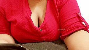 The Asian milf says, 'Watch me play with my big boobs.'