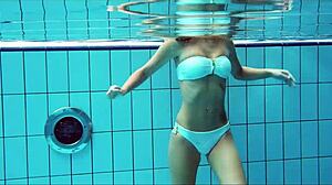 Nata feels horny swimming, tight pussy aching.