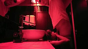 A couple engages in passionate sex in the bathroom