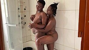 Black African lesbians dominate with intense bathroom fucking behind scenes.