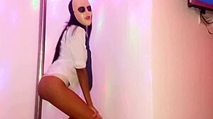 Skinny Brunette Student Bribes Teacher on Halloween for Homemade Pole Dance Porn.