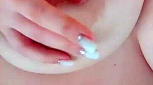 Busty Beauty Teases Big Nipples While Parents Sleep