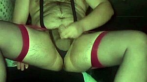 Gay guy in red stockings jerks his small dick while showing off his huge ass.