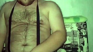 Gay guy in red stockings jerks his small dick while showing off his huge ass.