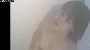 Japanese Babe’s Natural Tits and Pussy Fingering in Shower—So Hot!