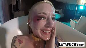 leya falcon rubs her ass with the tub shower head