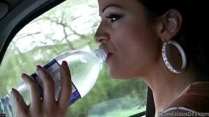 hot babe stroking cock in car while guy drives, caught on wild tape.