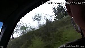 hot babe stroking cock in car while guy drives, caught on wild tape.