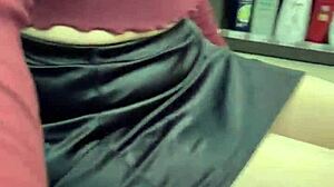 Asian ladyboy flaunts sexy thong in public store setting.