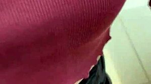 Asian ladyboy flaunts sexy thong in public store setting.