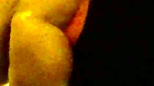 Gay Guy Deepthroats Dildo In Hood.