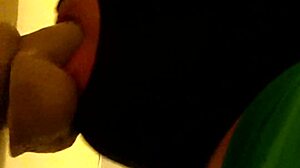 Gay Guy Deepthroats Dildo In Hood.