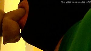 Gay Guy Deepthroats Dildo In Hood.