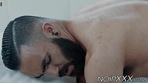 Muscular black gay stud demolishes bearded white hunk with massive cock