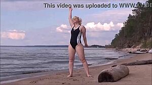 yo, check this blonde with big tits bathing at sea, so hot!