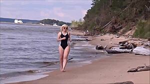 yo, check this blonde with big tits bathing at sea, so hot!