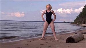 yo, check this blonde with big tits bathing at sea, so hot!