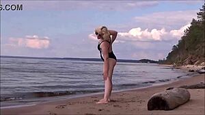 yo, check this blonde with big tits bathing at sea, so hot!