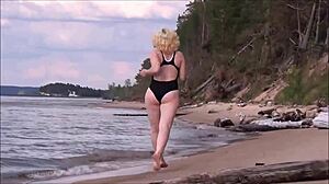 yo, check this blonde with big tits bathing at sea, so hot!