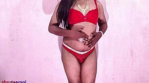 Sissy Shrutee crossdresses boldly, Asian Indian amateur masturbates to orgasm with handjob.