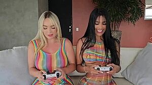 Brunette Girl And Blonde Girl Eat Each Others Pussies While Playing Video Games