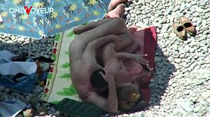 Beach voyeur catches mature couple in action