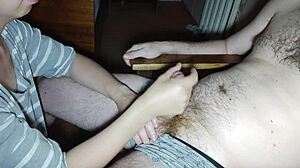 She leaned in close, whispering to just sit back while she worked that cock. Her thong slid aside as cum spilled everywhere.