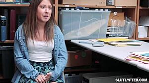 Officer Nathan Bronson checks Ophelia Purr's compliance in the office.