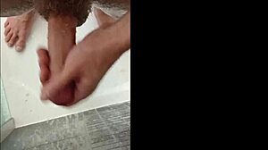 blonde bodybuilder intensely showers muscular cock