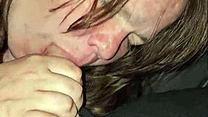 The wife spits on the cock, moans loudly, and deepthroats passionately.