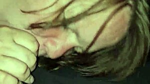 The wife spits on the cock, moans loudly, and deepthroats passionately.