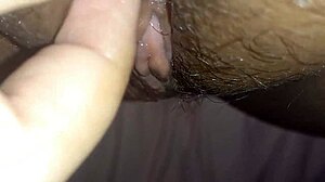 latina teases with her very wet big pussy and huge clit in softcore homemade clip, dripping for the camera.