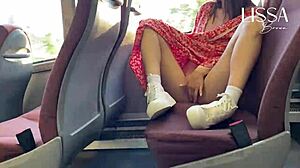 This hot woman just flashed her small tits on a public bus. She couldn’t resist touching herself.