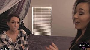 Brunette Sinn Sage dominates Lily Labeau with a big strap on cock. They enjoy a juicy session together.