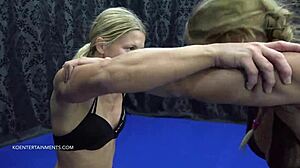 Watch Nikky Thorne and Diana wrestle topless? Their big tits rubbing in that lesbian match!