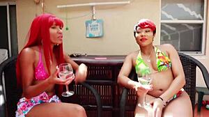 yo, check these ebony redhead chicks sucking big black cock with deepthroat skills!