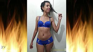 Beautiful brunette in blue lingerie flashes her sexy ass