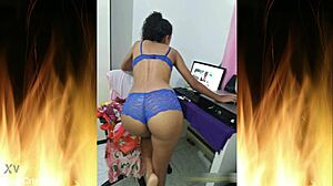 Beautiful brunette in blue lingerie flashes her sexy ass