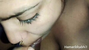 Hot Indian desi bhabhi sucks hard dick in steamy blowjob video. Couple gets wild!