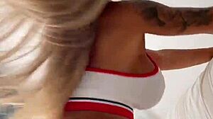 Monika fox strips out of her sport outfit seductively.