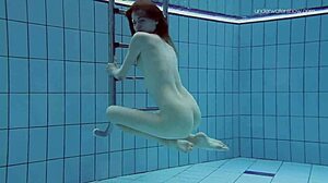 yo, anna netrebko looks hot swimming softcore in that bikini! 🏊‍♀️