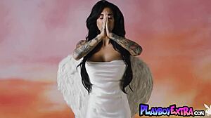 Angel Joanna Angel strips naked, revealing her sultry tattoos