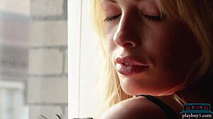 Sexy Canadian blonde Katie Jean teases in solo softcore striptease video.