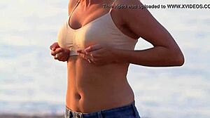 Lady in bra displays softly bouncing boobs in clothed softcore scene