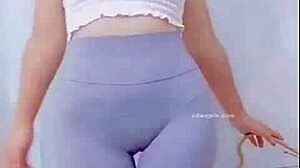 Asian Girl Dancing With a Teasing Cameltoe Show