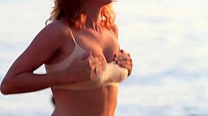 Lady in bra displays softly bouncing boobs in clothed softcore scene