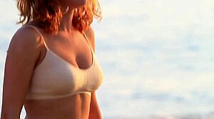 Lady in bra displays softly bouncing boobs in clothed softcore scene